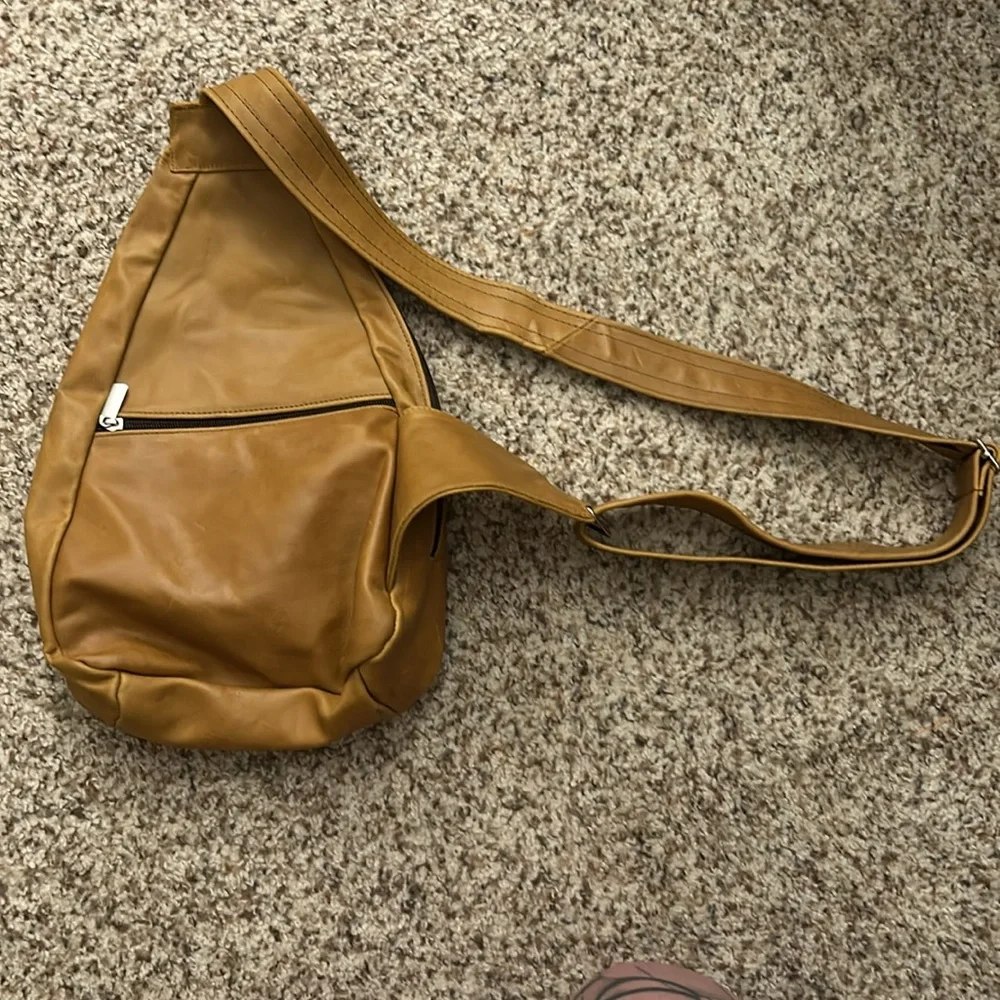 Genuine leather sling backpack